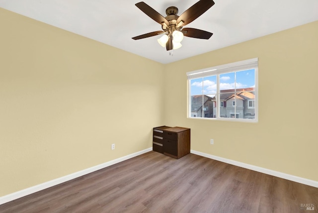 spare room with ceiling fan and light hardwood / wood-style flooring