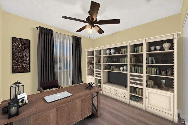 office area with hardwood / wood-style floors and ceiling fan