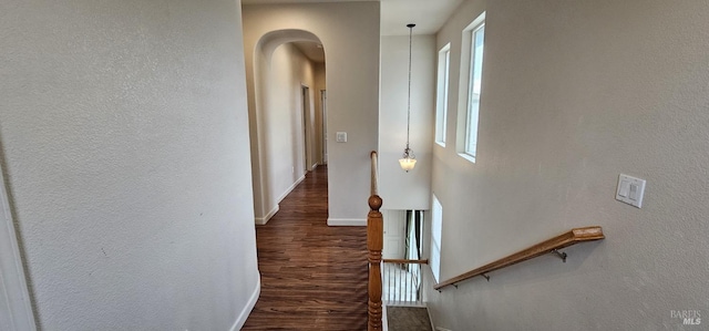 corridor featuring dark hardwood / wood-style floors