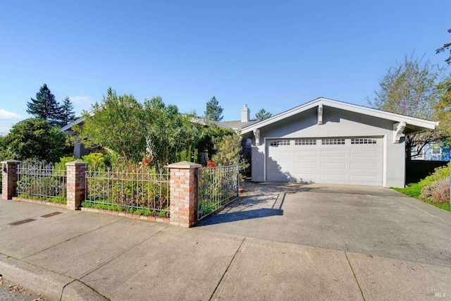 ranch-style house featuring a garage