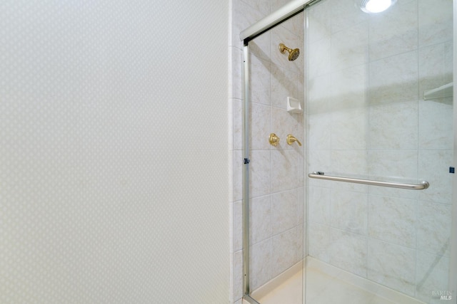 bathroom featuring a stall shower