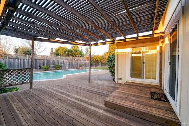 deck with a fenced backyard, a fenced in pool, and a pergola