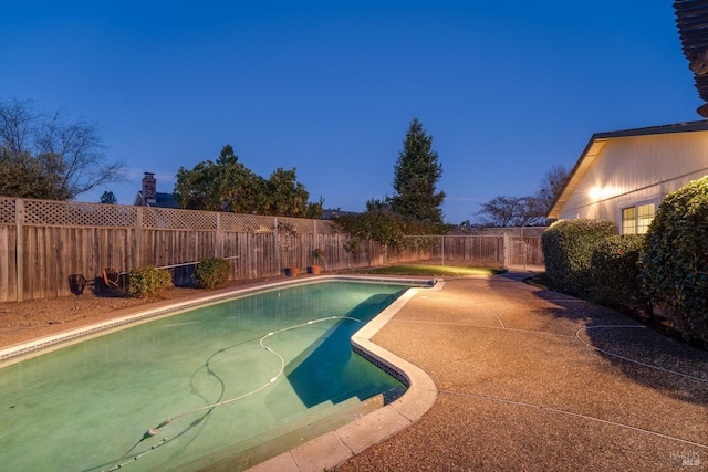 view of pool with a patio, a fenced backyard, and a fenced in pool