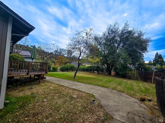 view of yard featuring a deck