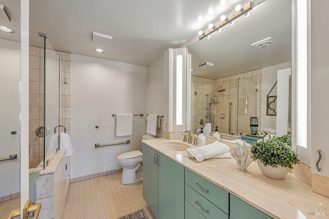 bathroom with tile patterned flooring, toilet, an enclosed shower, and vanity