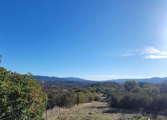 view of mountain feature with a rural view