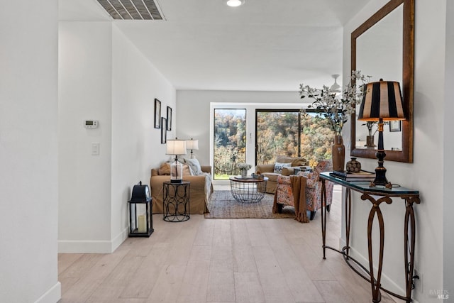 hallway featuring light hardwood / wood-style floors