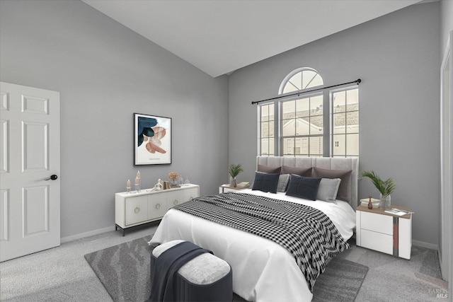 carpeted bedroom with lofted ceiling