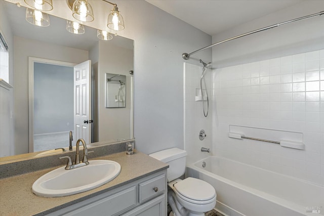 full bathroom with vanity,  shower combination, and toilet