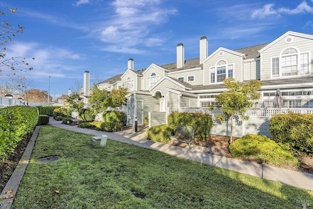 exterior space featuring a front lawn