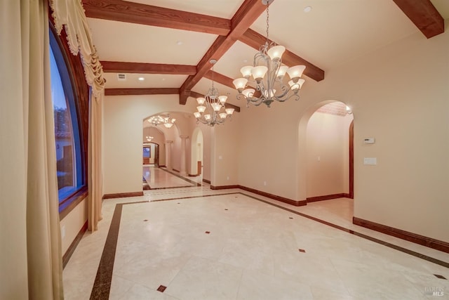 tiled empty room with a chandelier and lofted ceiling with beams