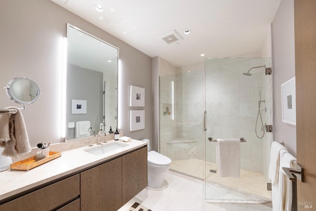 bathroom featuring an enclosed shower, vanity, toilet, and tile patterned floors