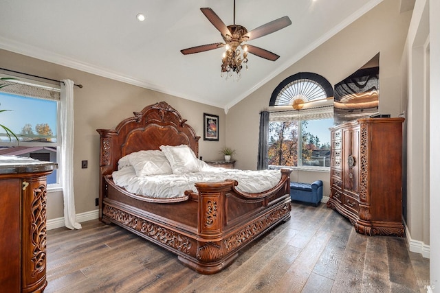 bedroom with ceiling fan, crown molding, lofted ceiling, and dark wood-type flooring