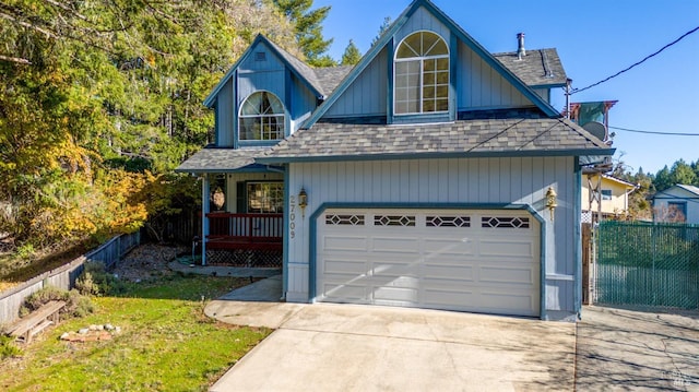 view of front of house featuring a garage and a front lawn