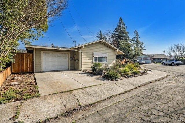 single story home with a garage