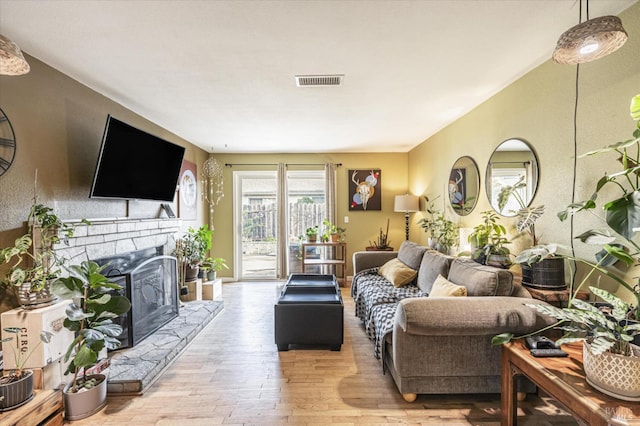 living room with light hardwood / wood-style floors