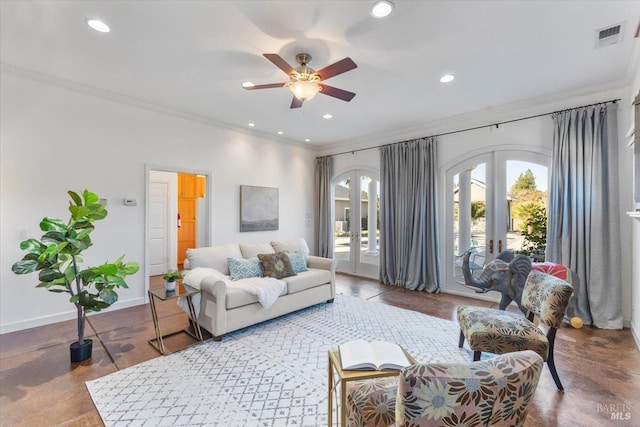 living room with crown molding, french doors, and ceiling fan