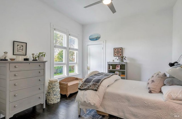 bedroom featuring dark hardwood / wood-style floors and ceiling fan