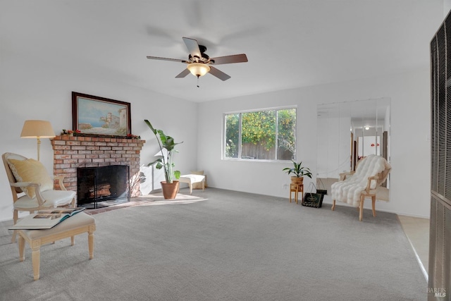 living room with carpet flooring, ceiling fan, and a brick fireplace