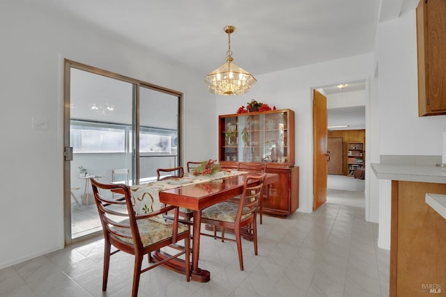 dining room featuring a chandelier