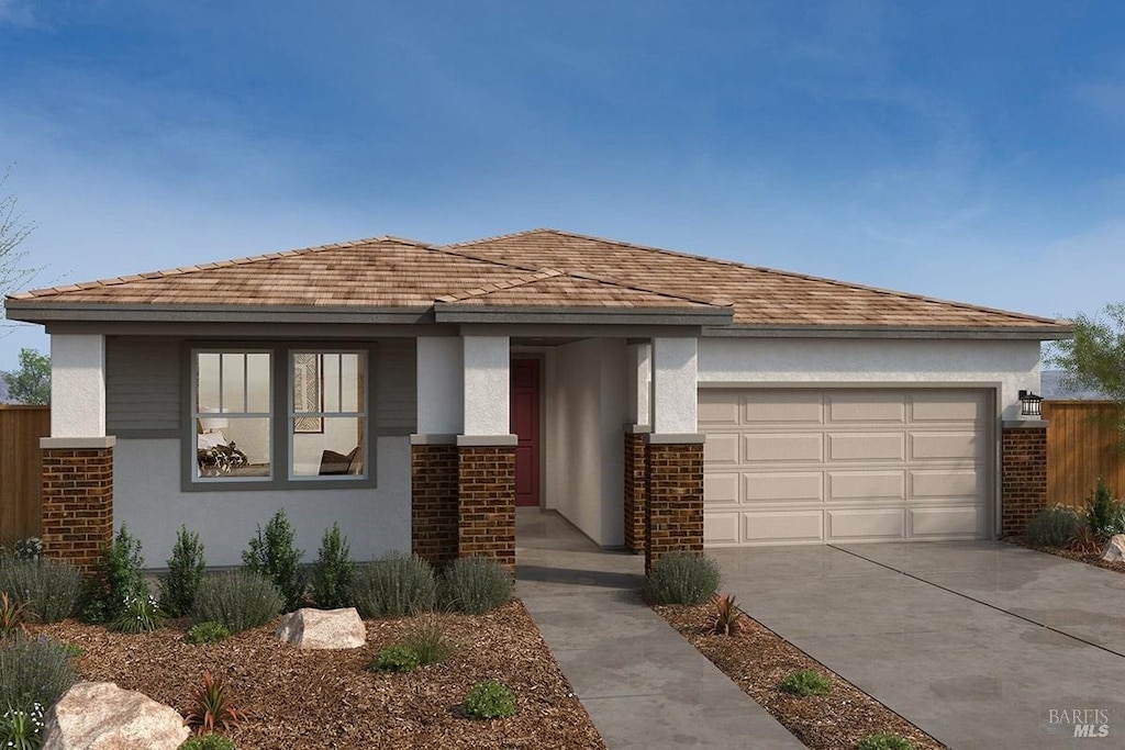 view of front of home with a garage