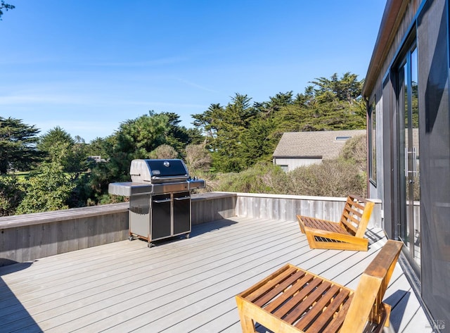 deck featuring grilling area