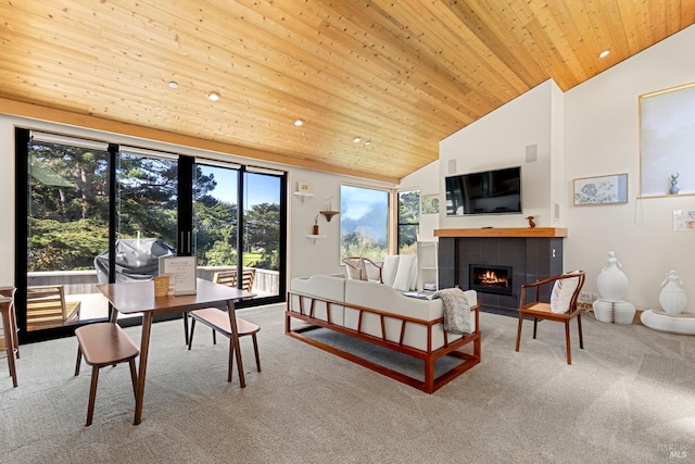 42267 Forecastle, The Sea Ranch, CA 95497 - living room featuring carpet floors, wooden ceiling, a tiled fireplace, and high vaulted ceiling