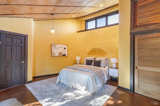 bedroom with a high ceiling