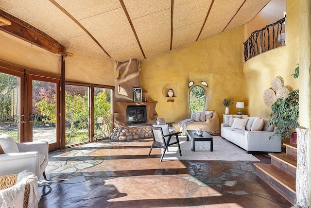 sunroom / solarium featuring a wealth of natural light and french doors