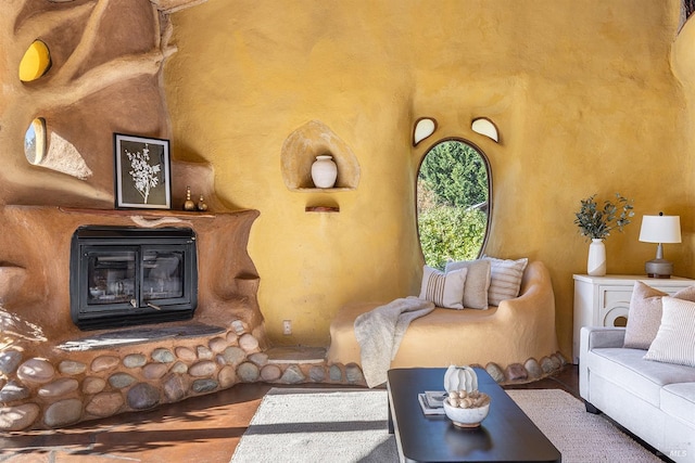 living room featuring a wood stove