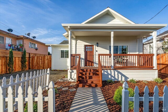 view of front of home featuring covered porch