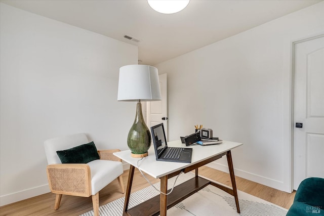 office space featuring light wood-type flooring