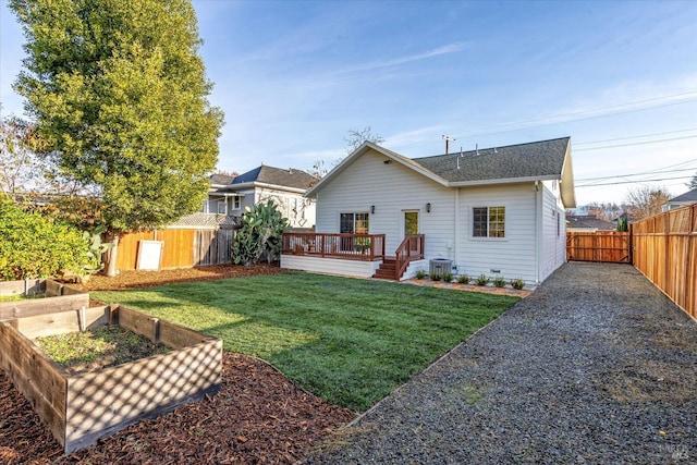 2221 Adrian St, Napa, CA 94558 - back of house with a vegetable garden, a wooden deck, roof with shingles, and central AC unit
