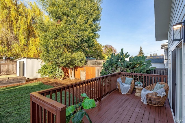 deck with a lawn and a storage unit