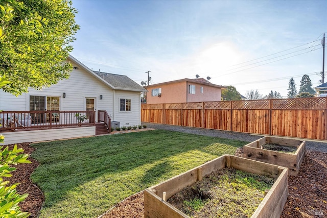 view of yard with a wooden deck