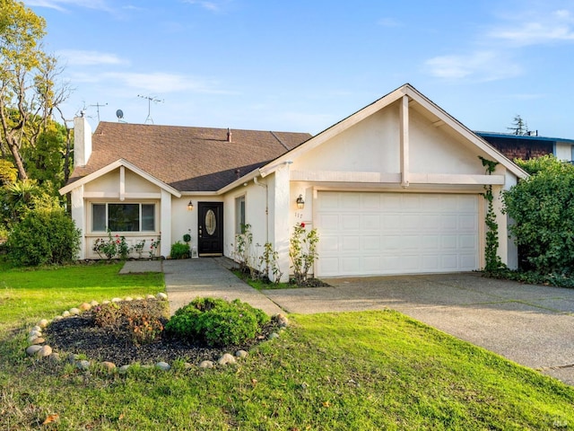 ranch-style house with a garage and a front yard