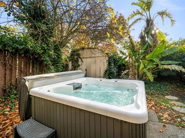 view of patio / terrace with a hot tub