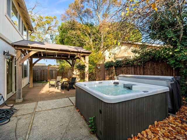 exterior details featuring a jacuzzi