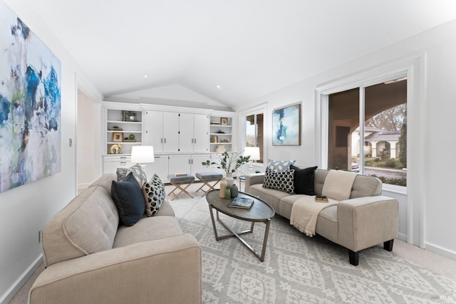 living room with light colored carpet and lofted ceiling