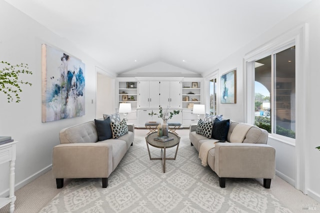 living room with light carpet and vaulted ceiling