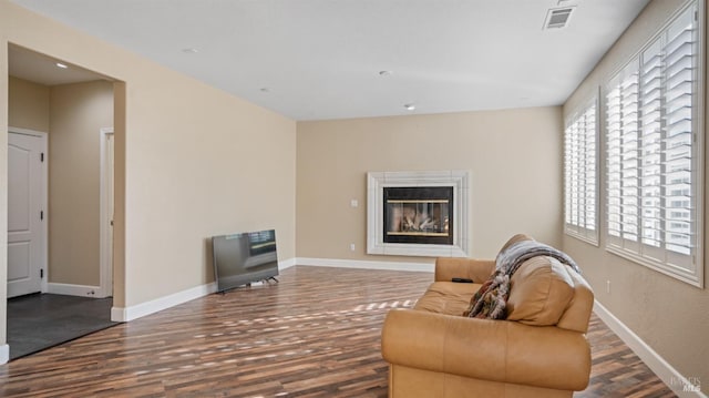 living room with dark wood-type flooring