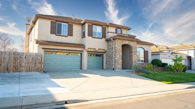 3914 Stonington Ct, Fairfield, CA 94533 - view of front of house featuring a garage, stucco siding, fence, driveway, and stone siding