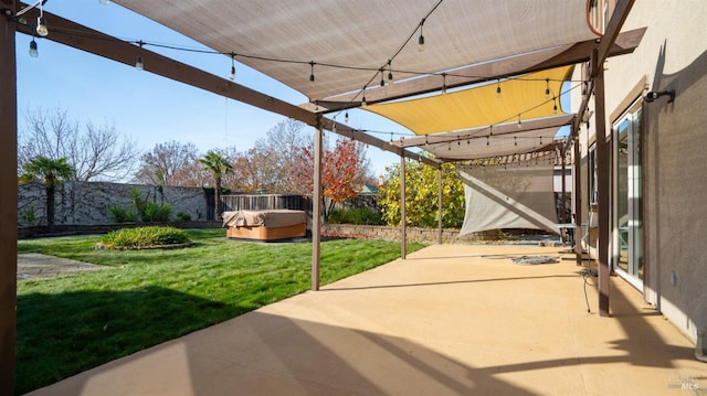 view of patio / terrace featuring a hot tub and a pergola