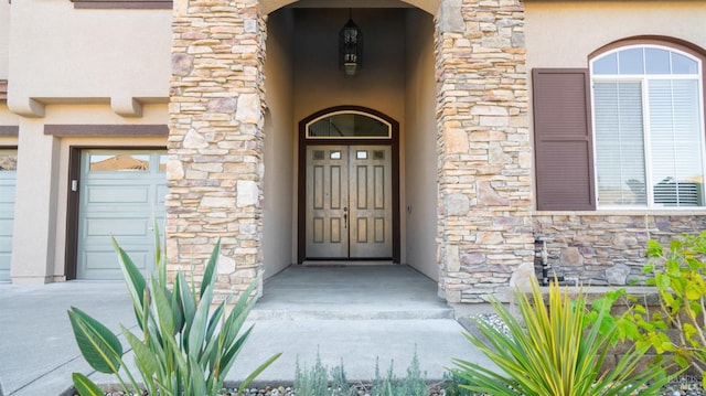 property entrance with a garage