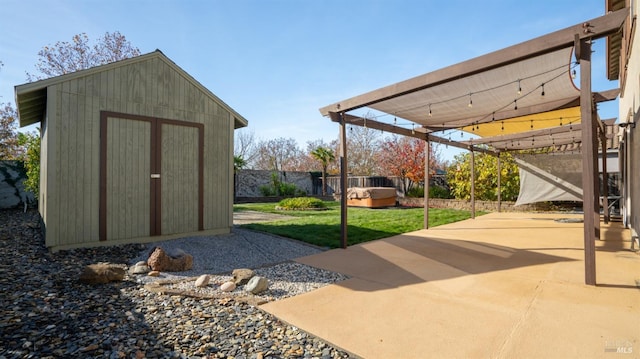 view of patio / terrace featuring a storage unit and a pergola