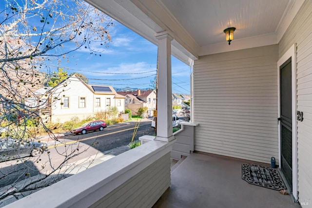 balcony featuring covered porch