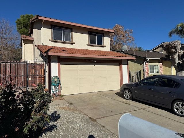 view of front of property with a garage