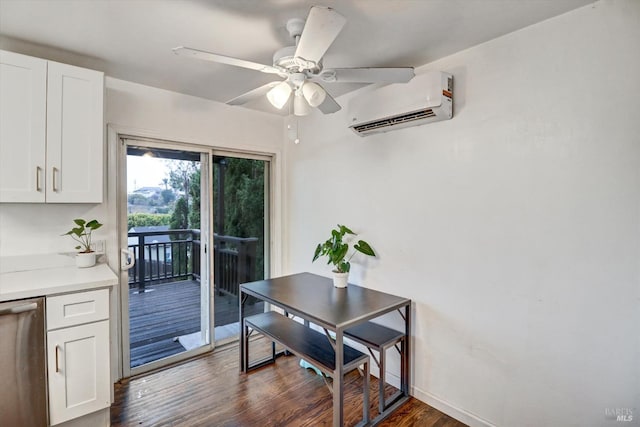 dining area featuring dark hardwood / wood-style flooring, a wall unit AC, and ceiling fan