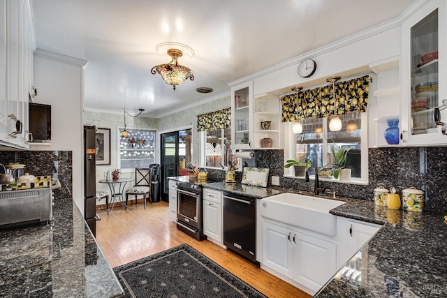 kitchen featuring pendant lighting, open shelves, white cabinetry, stainless steel range with electric stovetop, and dishwasher