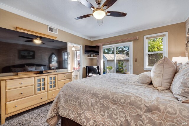 bedroom with access to exterior, a ceiling fan, visible vents, and crown molding